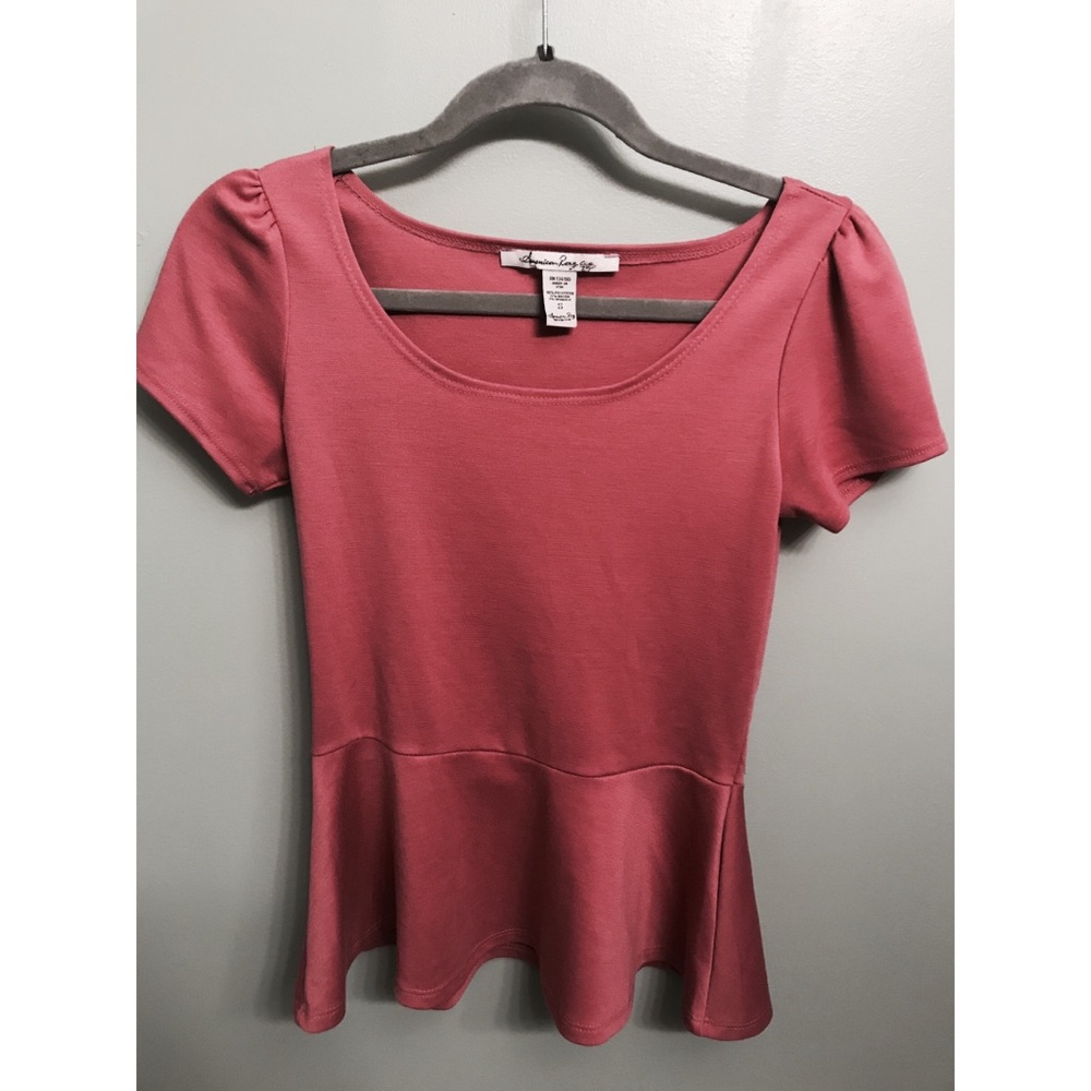 Pink blouse with pleated waist